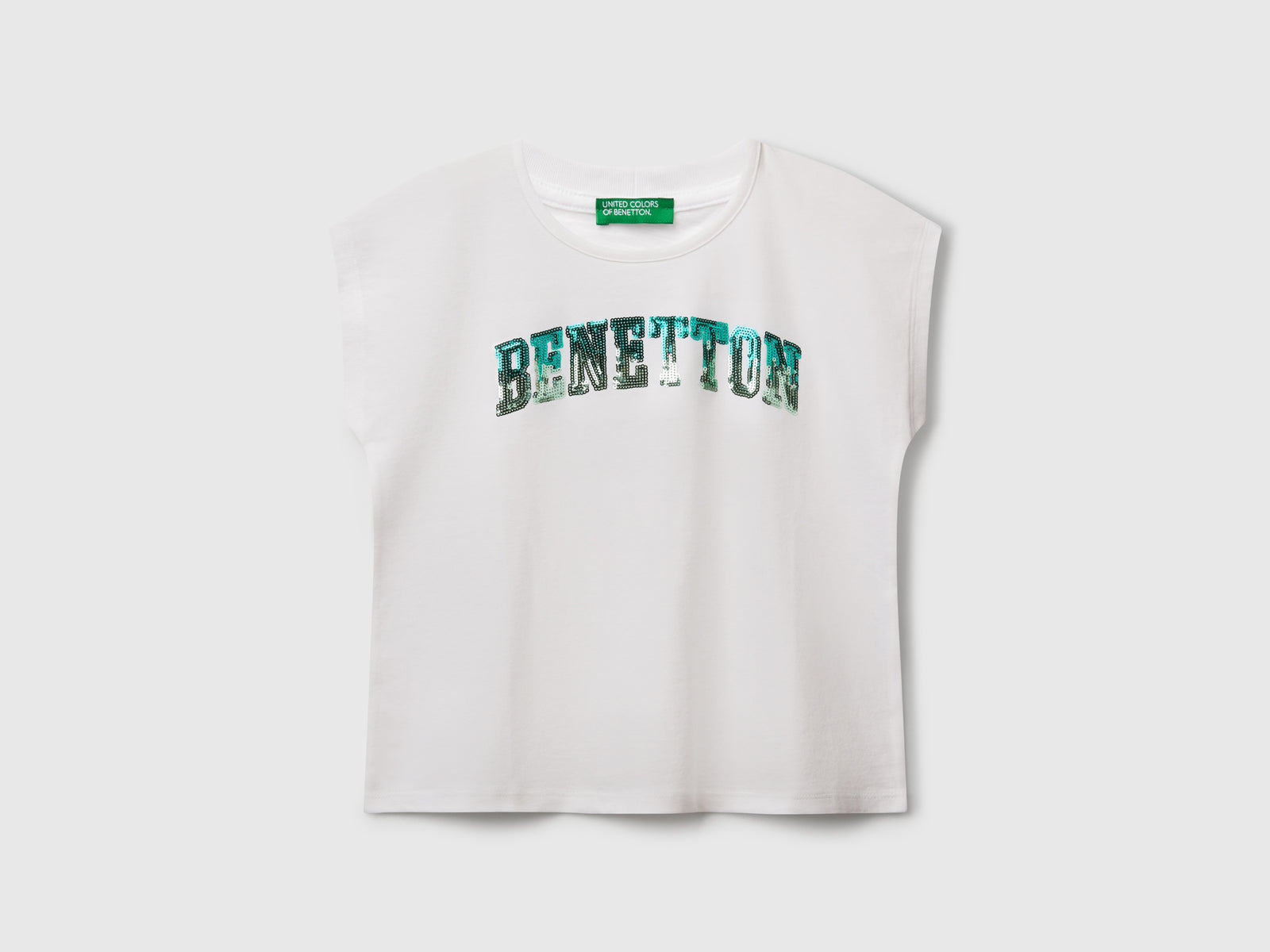 T-shirt con paillettes da bambina bianco | Benetton Outlet