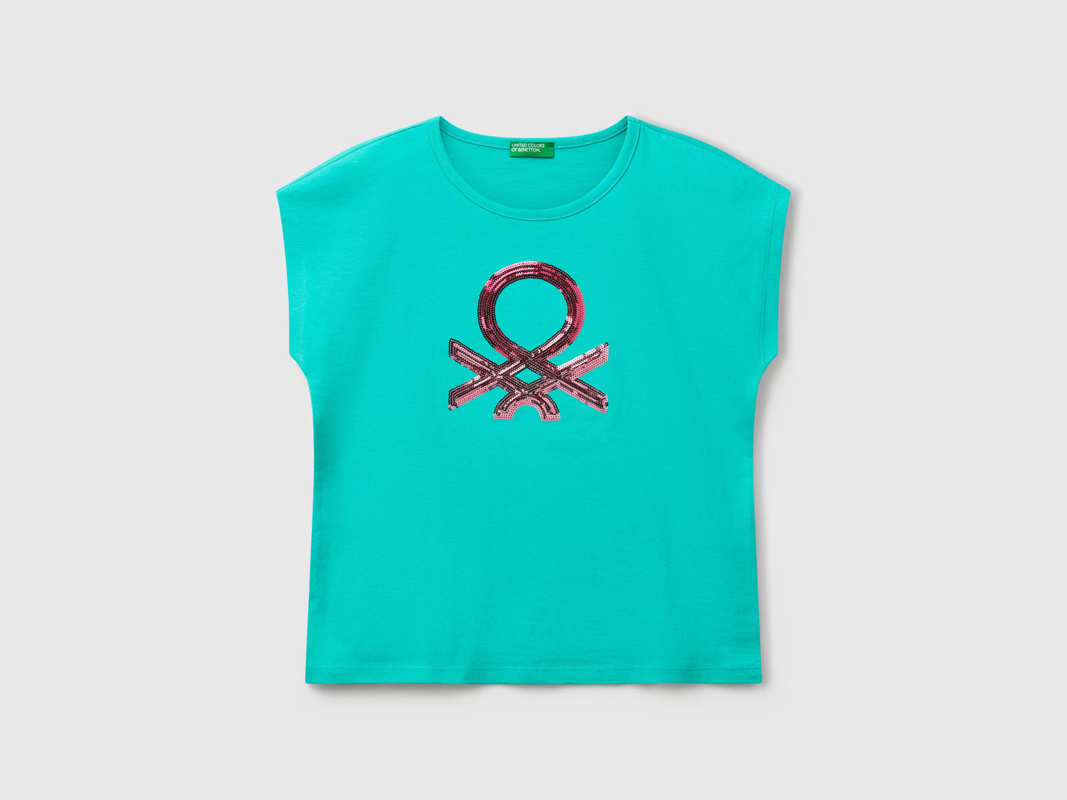 T-shirt con paillettes da bambina celeste fluo | Benetton Outlet