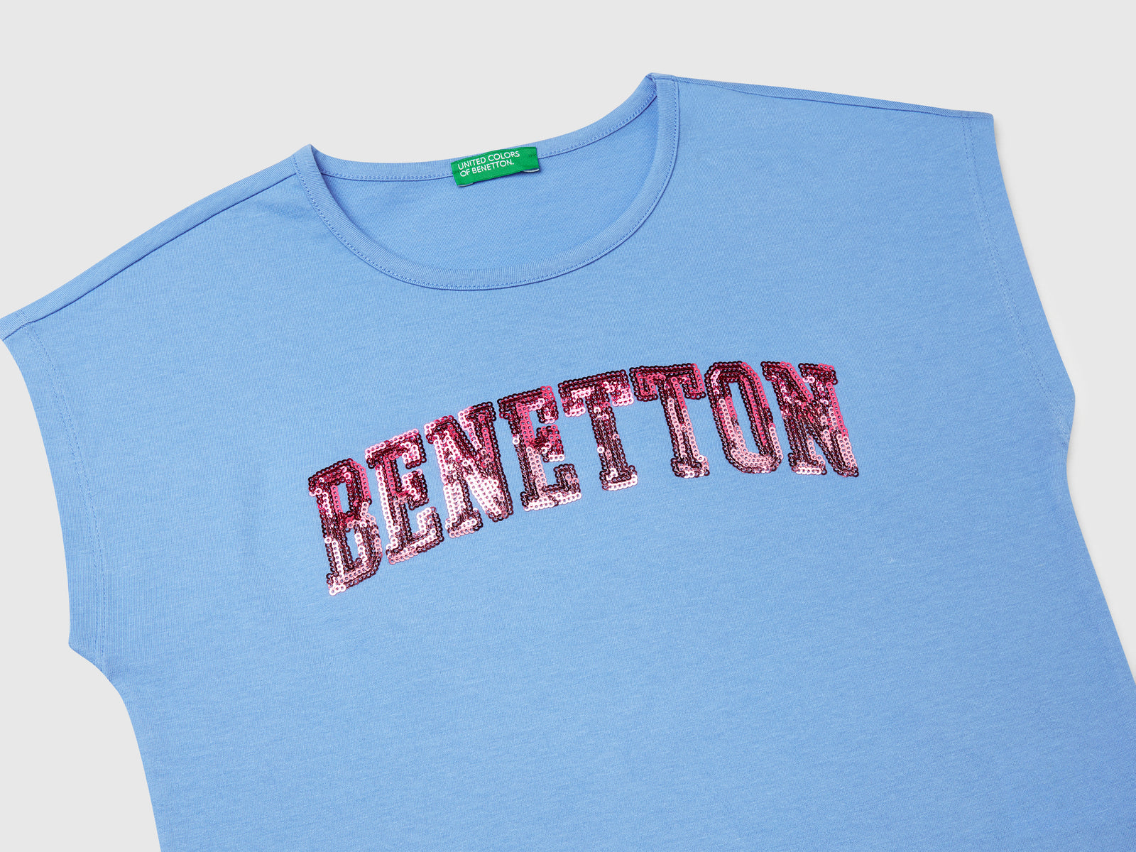T-shirt con paillettes da bambina celeste 3 | Benetton Outlet