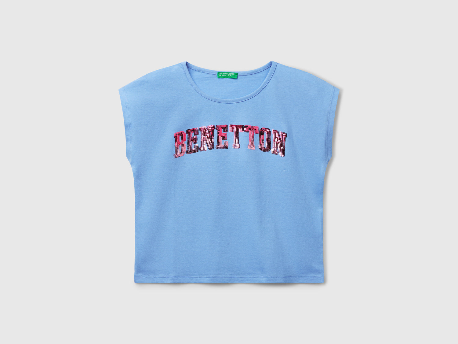 T-shirt con paillettes da bambina celeste | Benetton Outlet