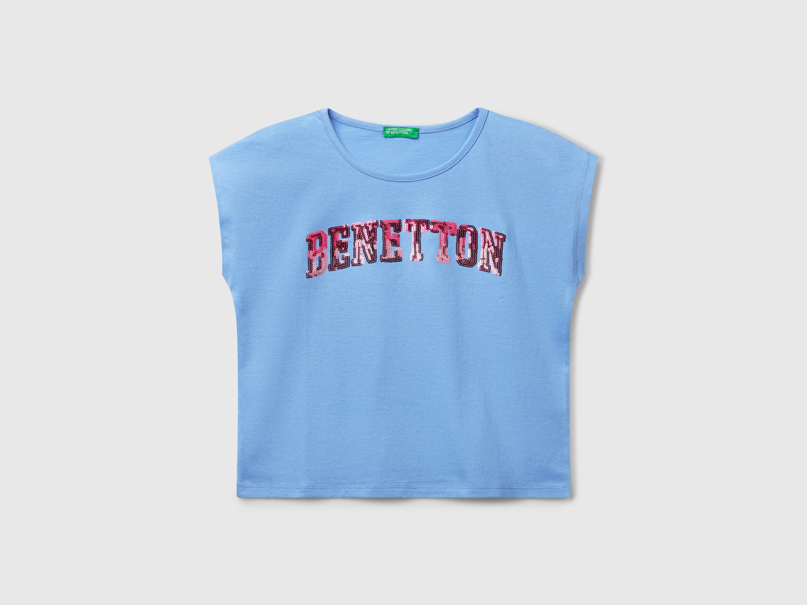T-shirt con paillettes da bambina celeste | Benetton Outlet