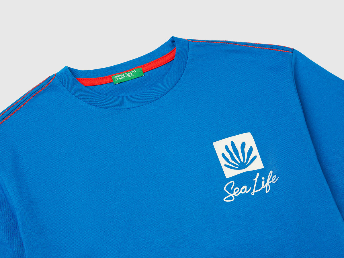 T-shirt con stampa slogan e ricamo
