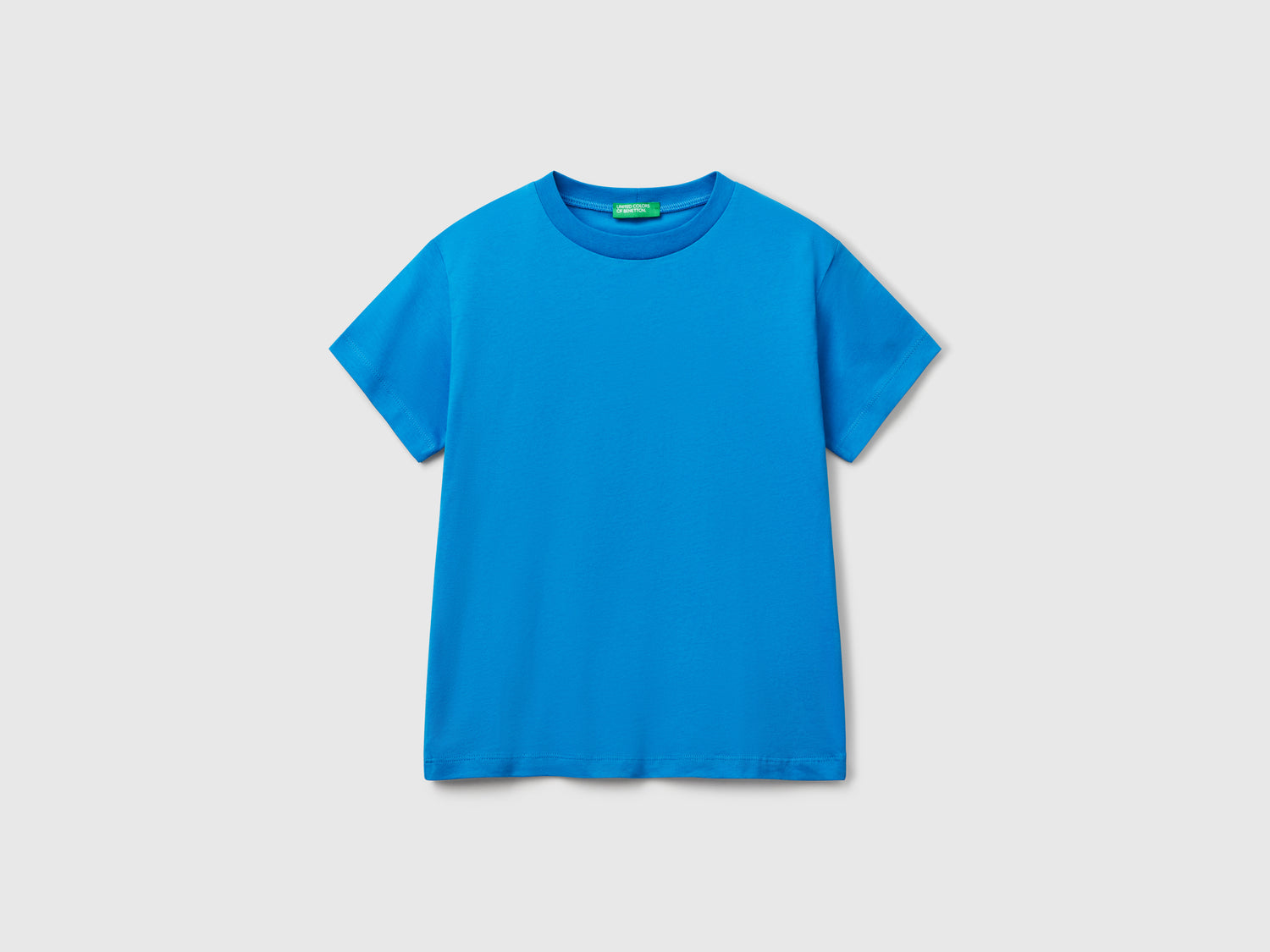 Maglietta in cotone con stampa sul retro da bambino blu | Benetton Outlet