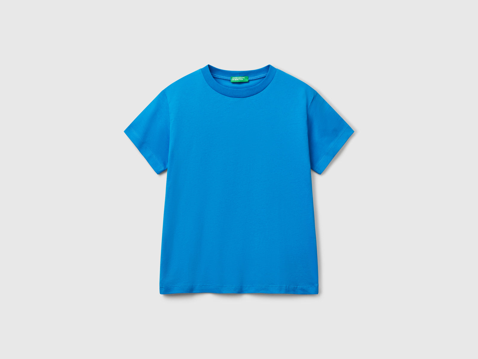 Maglietta in cotone con stampa sul retro da bambino blu | Benetton Outlet