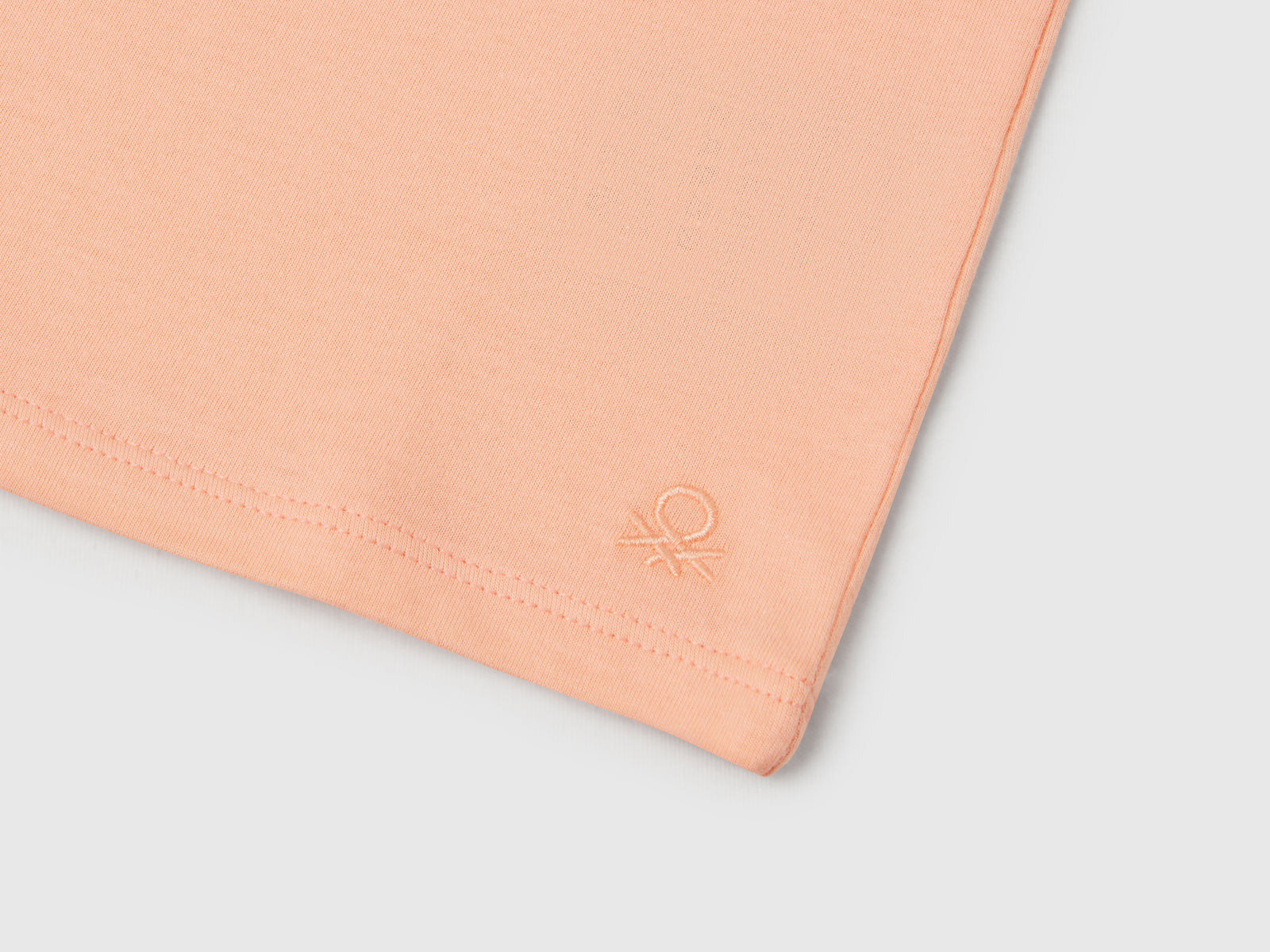 Maglietta a manica corta da bimba pesca 3 | Benetton Outlet