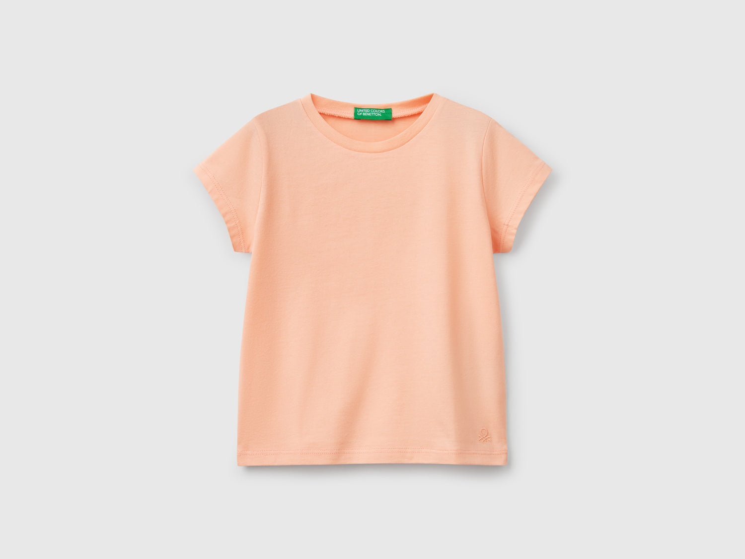 Maglietta a manica corta da bimba pesca | Benetton Outlet