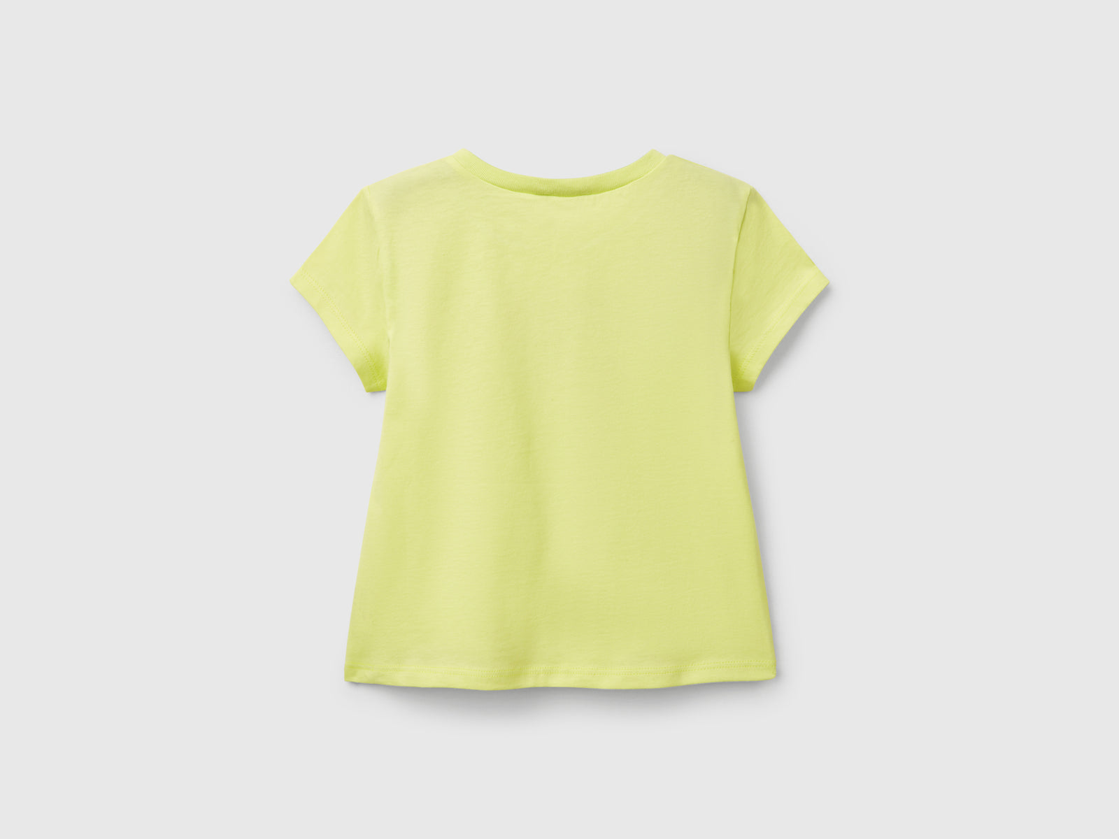 Maglietta con stampa glitter da bimba lime 2 | Benetton Outlet