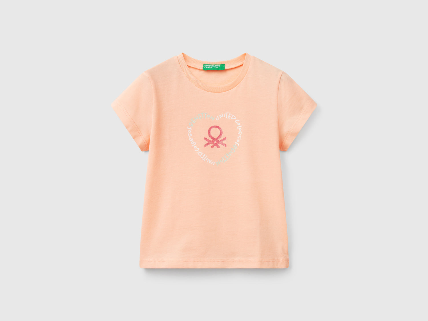 Maglietta con stampa glitter da bimba pesca | Benetton Outlet