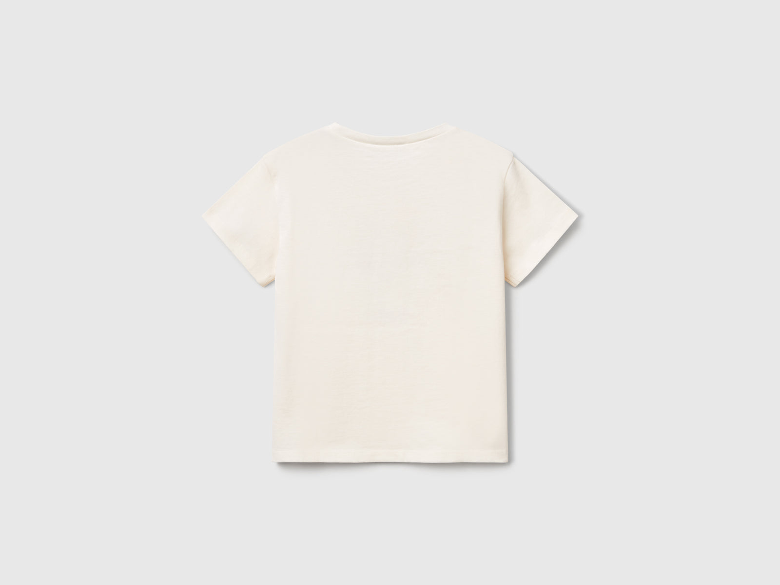 T-shirt con stampa e applicazione da bimba bianco panna 2 | Benetton Outlet