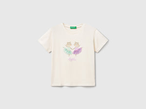 T-shirt con stampa e applicazione
