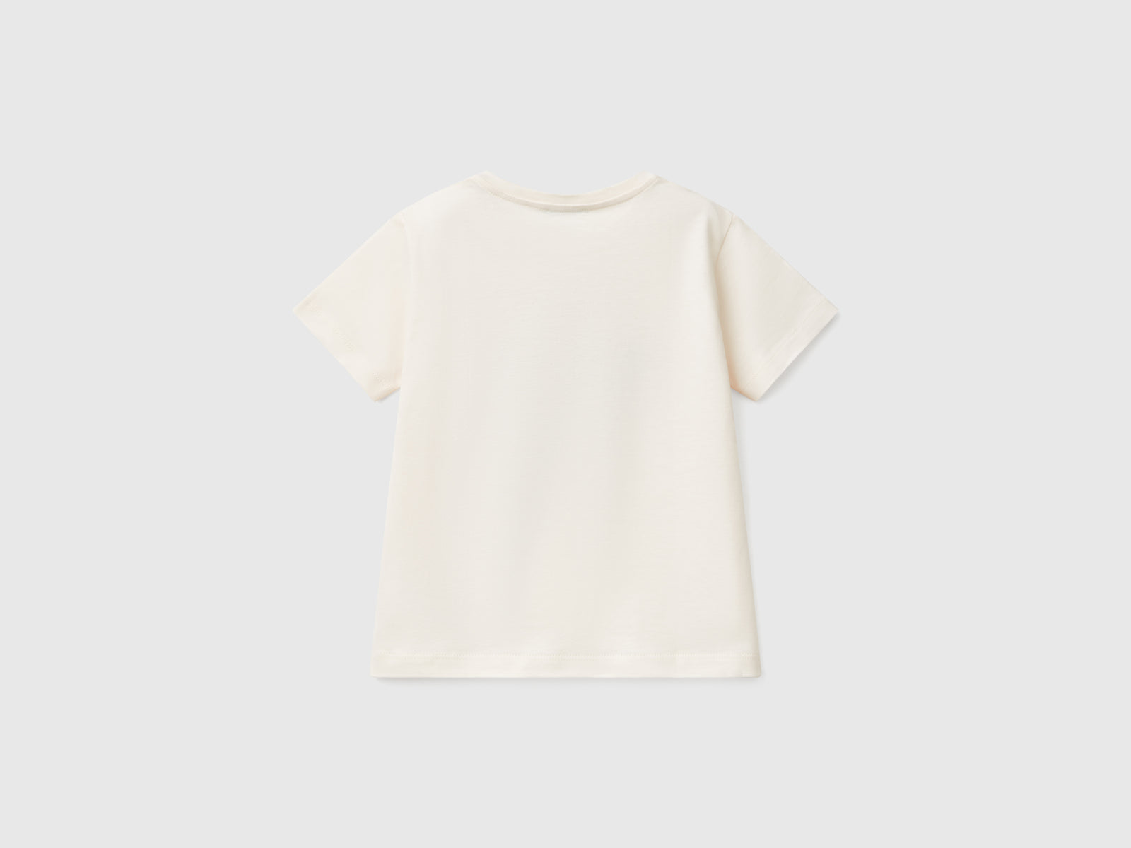 Maglietta in cotone con stampa da bimbo bianco panna 2 | Benetton Outlet