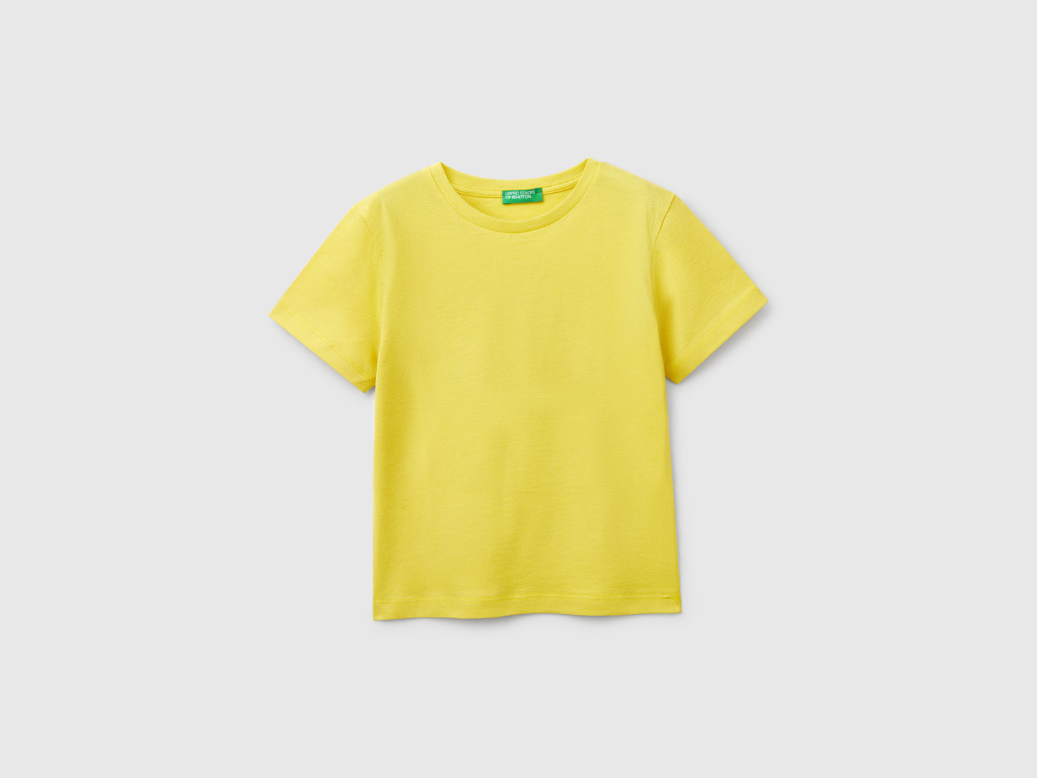 Maglietta in cotone con stampa da bimbo giallo | Benetton Outlet