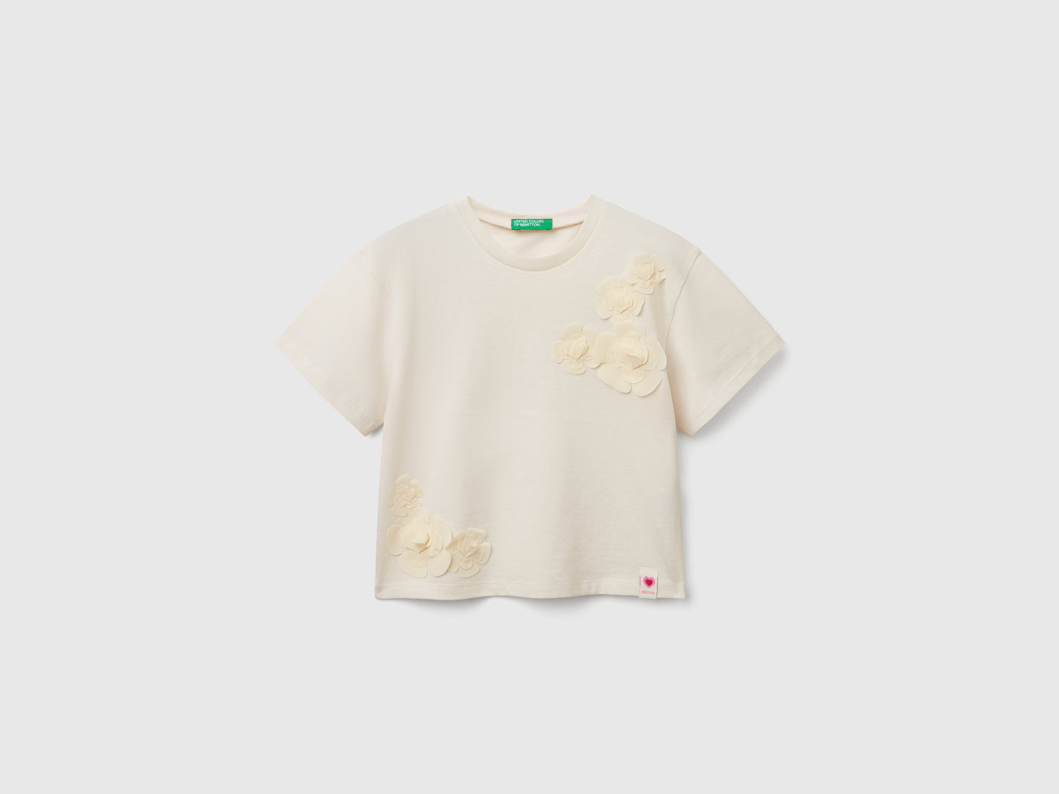 T-shirt con applicazioni da bimba beige | Benetton Outlet