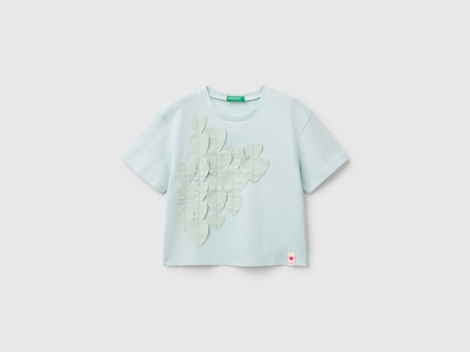 T-shirt con applicazioni da bimba verde acqua | Benetton Outlet