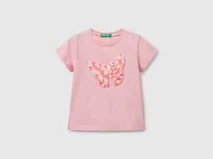 T-shirt con applicazione effetto petali