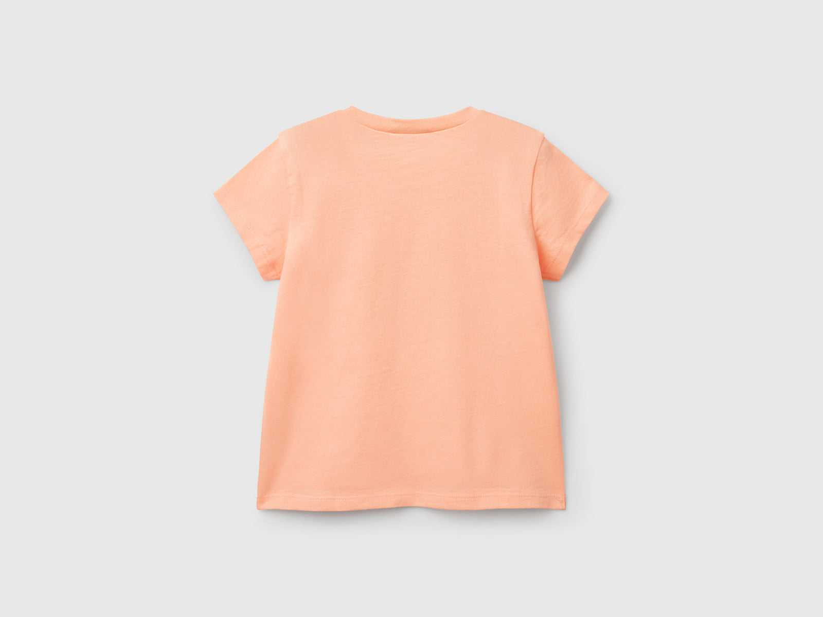 T-shirt con applicazione effetto petali da bimba pesca 2 | Benetton Outlet