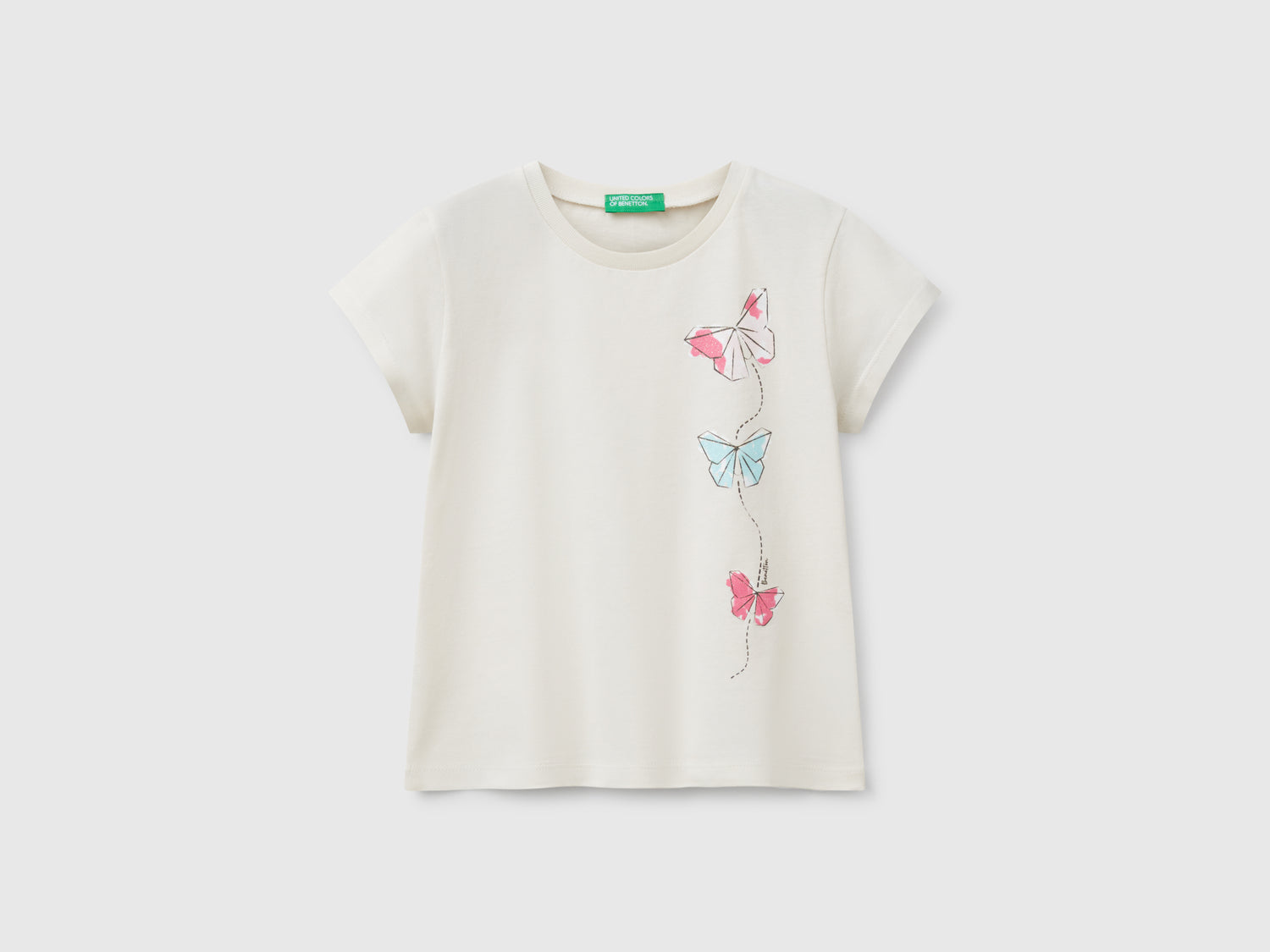 T-shirt in cotone con glitter da bimba beige | Benetton Outlet