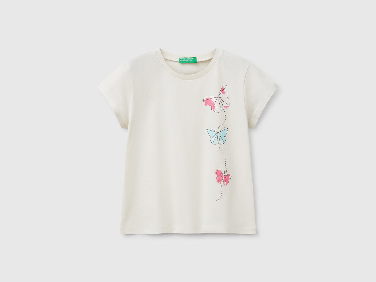 T-shirt in cotone con glitter da bimba beige | Benetton Outlet
