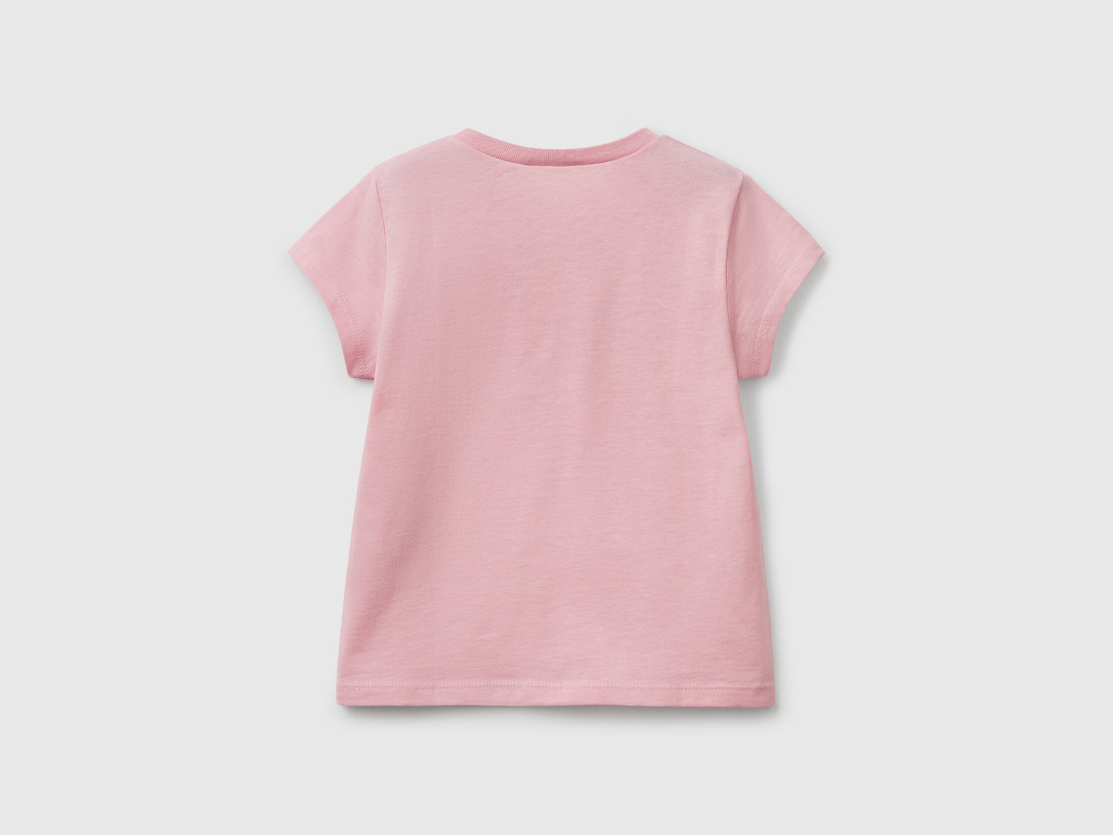 T-shirt in cotone con glitter da bimba rosa 2 | Benetton Outlet