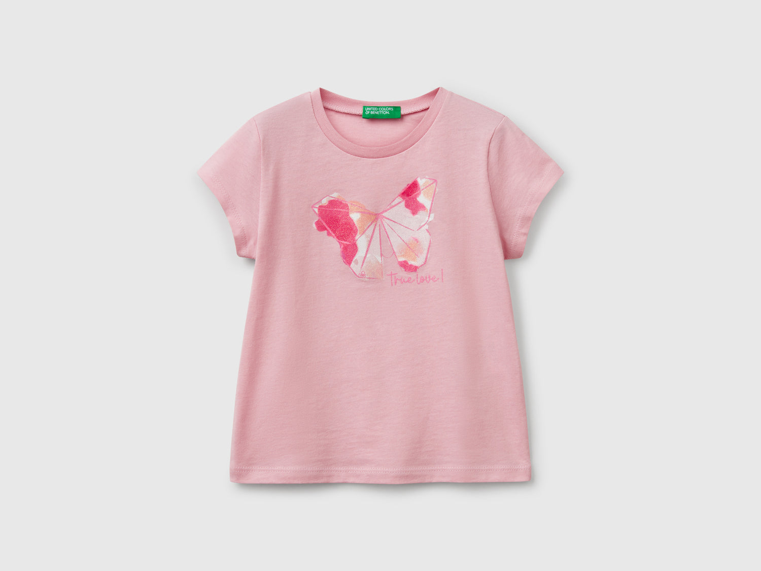 T-shirt in cotone con glitter da bimba rosa | Benetton Outlet