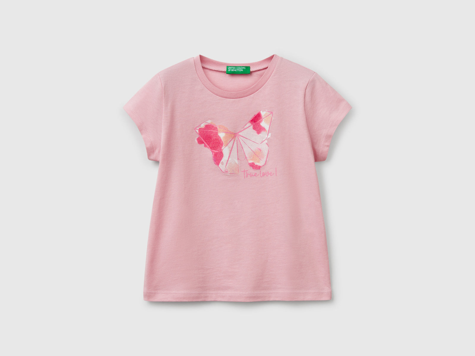 T-shirt in cotone con glitter da bimba rosa | Benetton Outlet