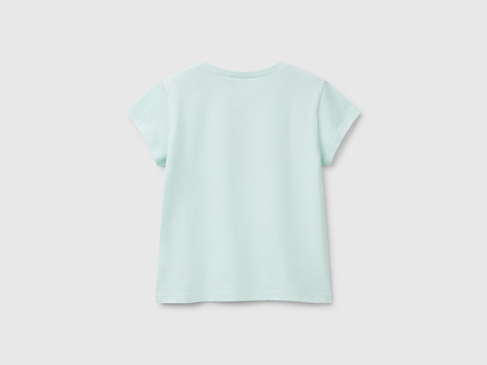 T-shirt in cotone con glitter da bimba verde acqua 2 | Benetton Outlet