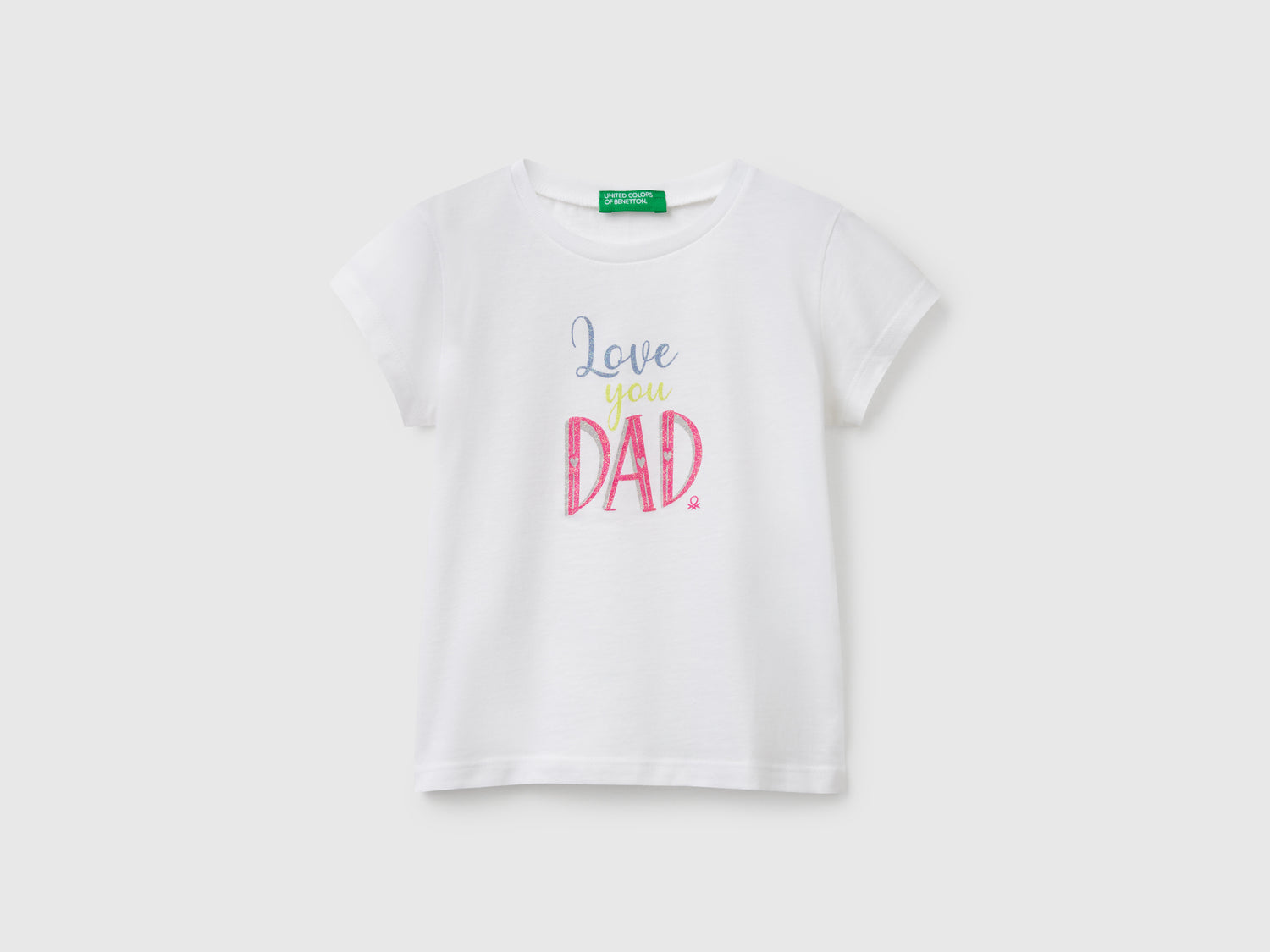 T-shirt in cotone con glitter da bimba bianco | Benetton Outlet
