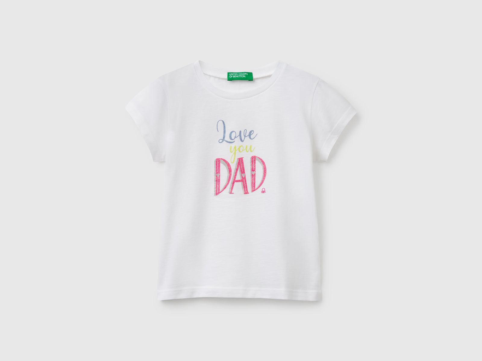 T-shirt in cotone con glitter da bimba bianco | Benetton Outlet