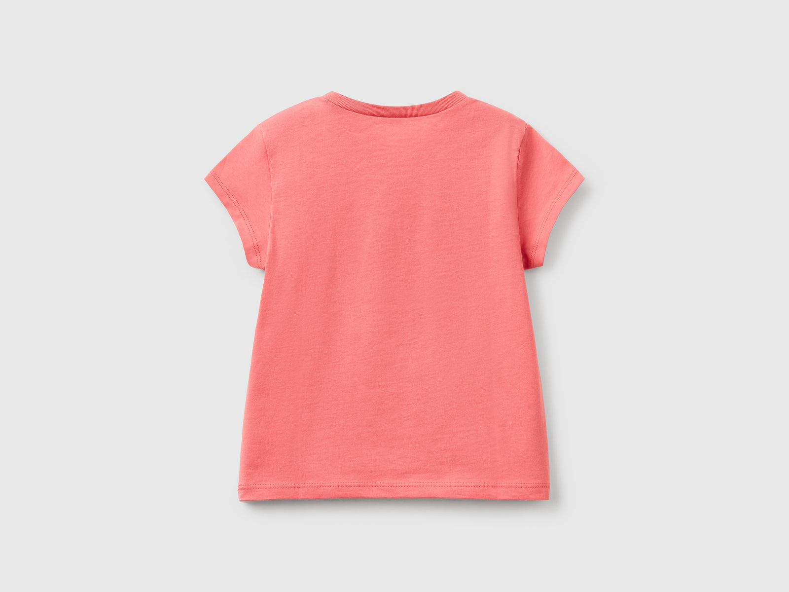 T-shirt in cotone con glitter da bimba salmone 2 | Benetton Outlet