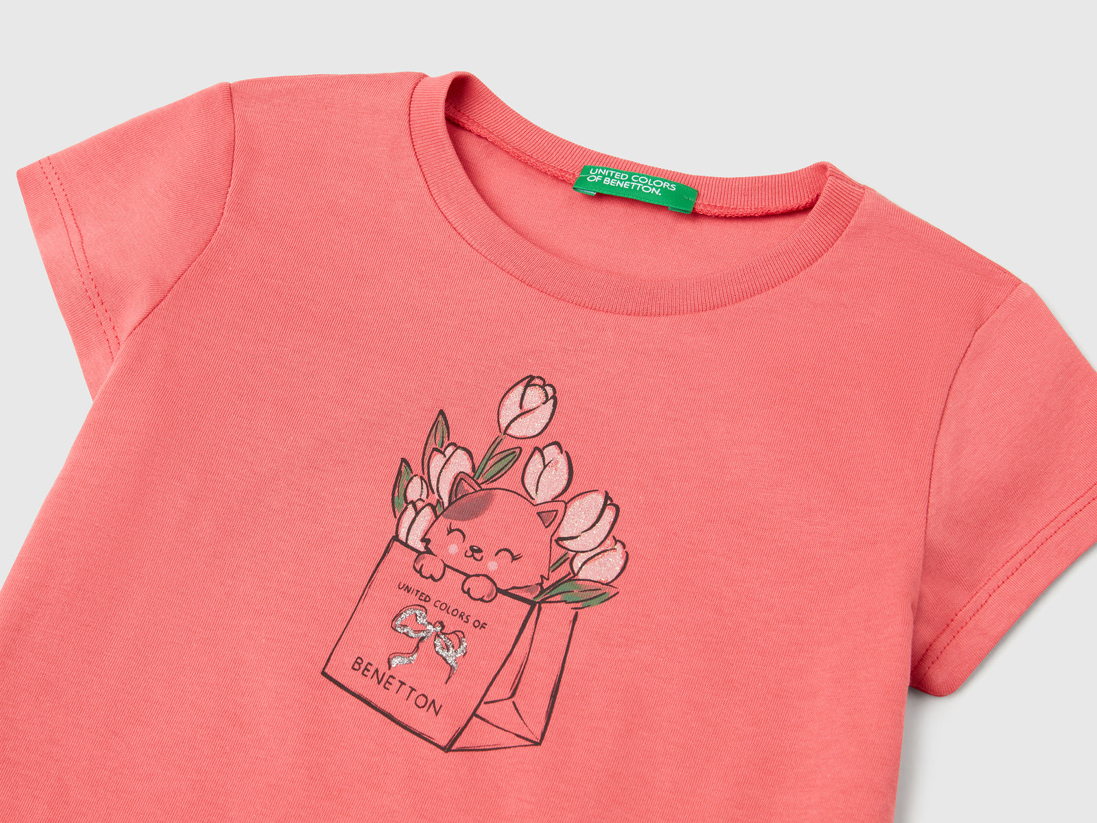 T-shirt in cotone con glitter da bimba salmone 3 | Benetton Outlet