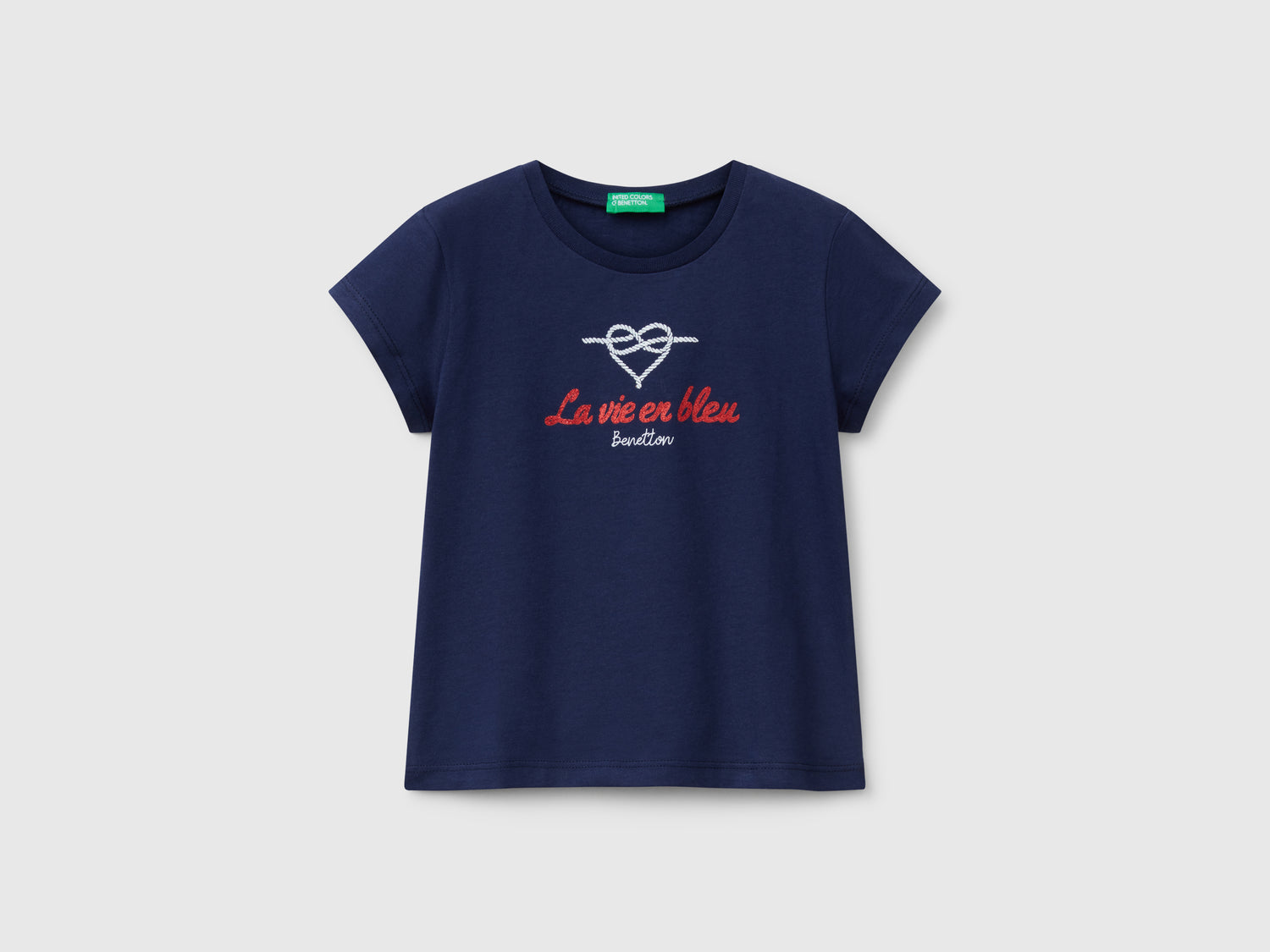 T-shirt in cotone con glitter da bimba blu scuro | Benetton Outlet