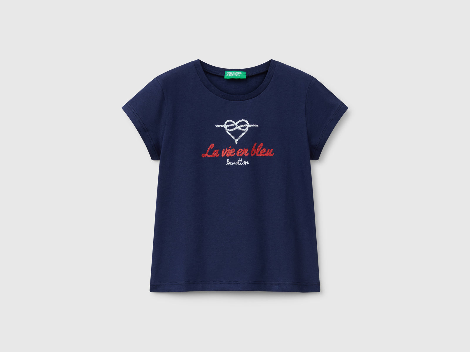 T-shirt in cotone con glitter da bimba blu scuro | Benetton Outlet