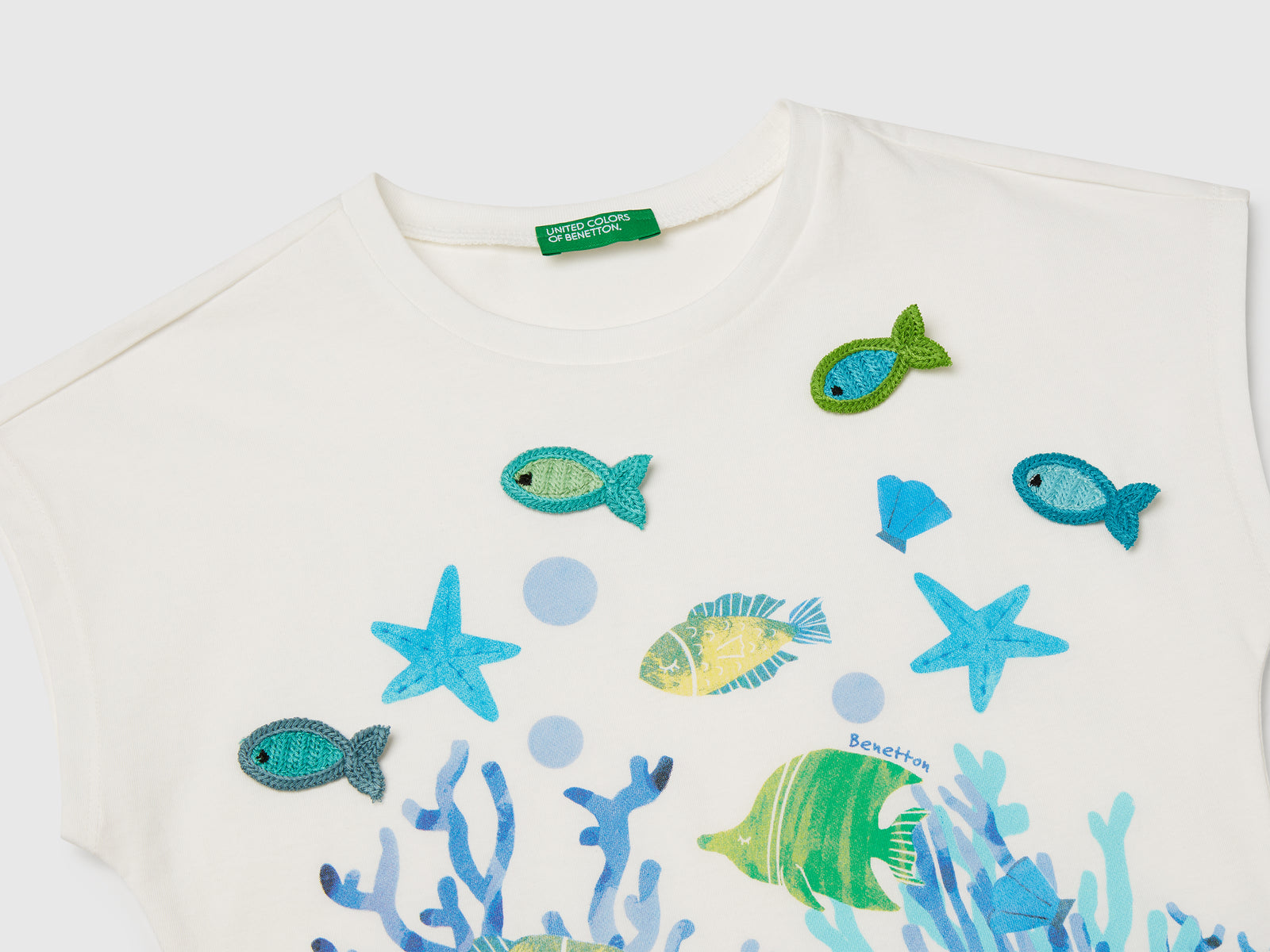 Maglietta con stampa e applicazioni crochet da bimba bianco panna 3 | Benetton Outlet