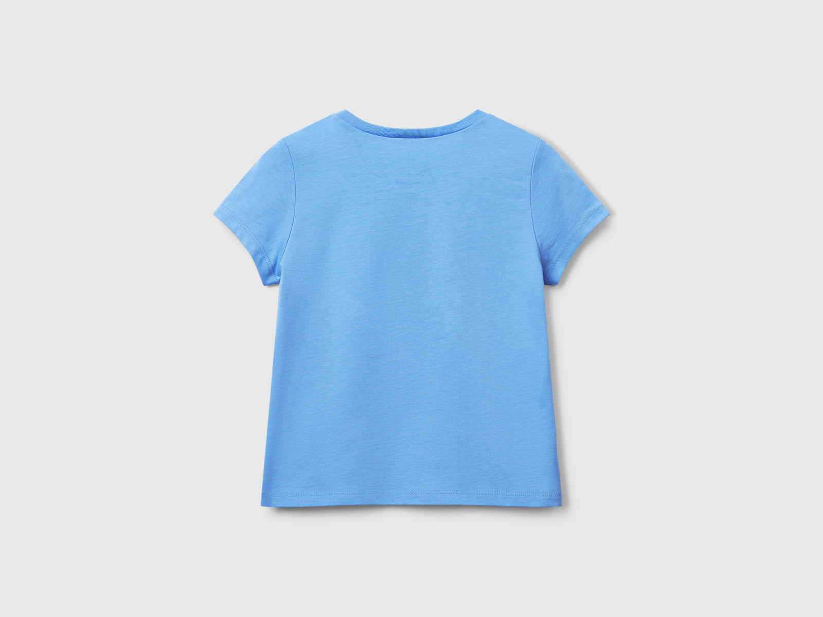 T-shirt regular fit con glitter da bimba celeste 2 | Benetton Outlet