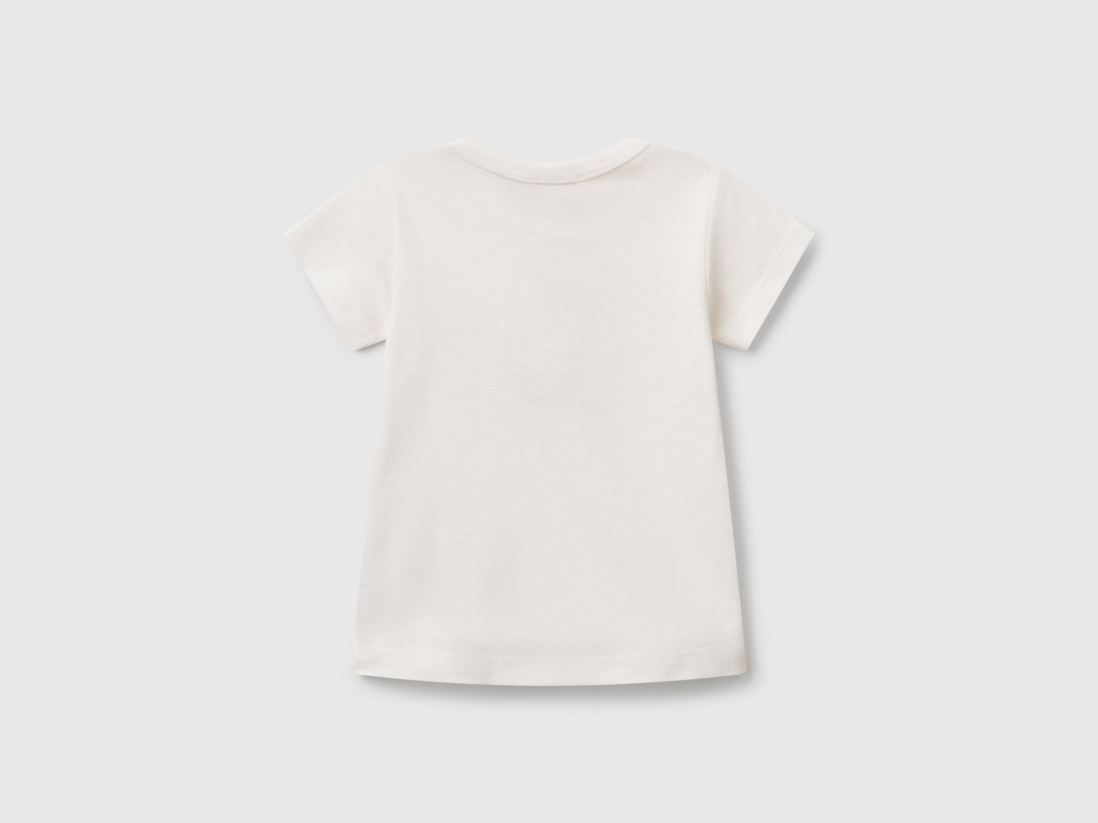 Maglietta in cotone da neonato bianco panna 2 | Benetton Outlet