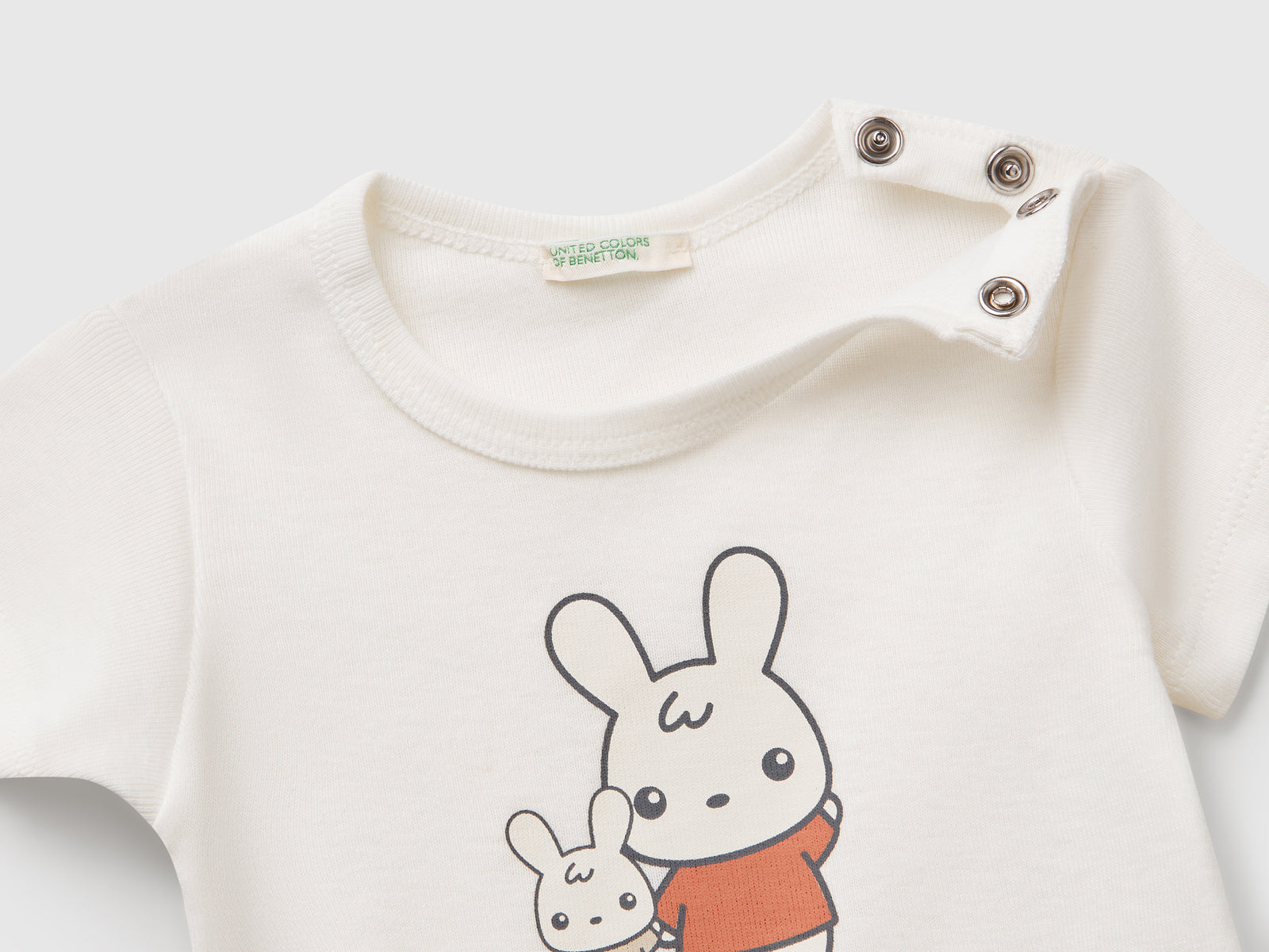 Maglietta in cotone da neonato bianco panna 3 | Benetton Outlet