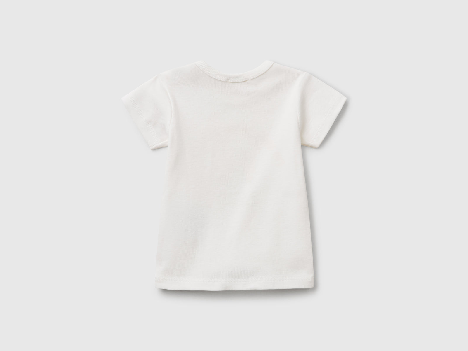 Maglietta in cotone da neonato bianco panna 2 | Benetton Outlet