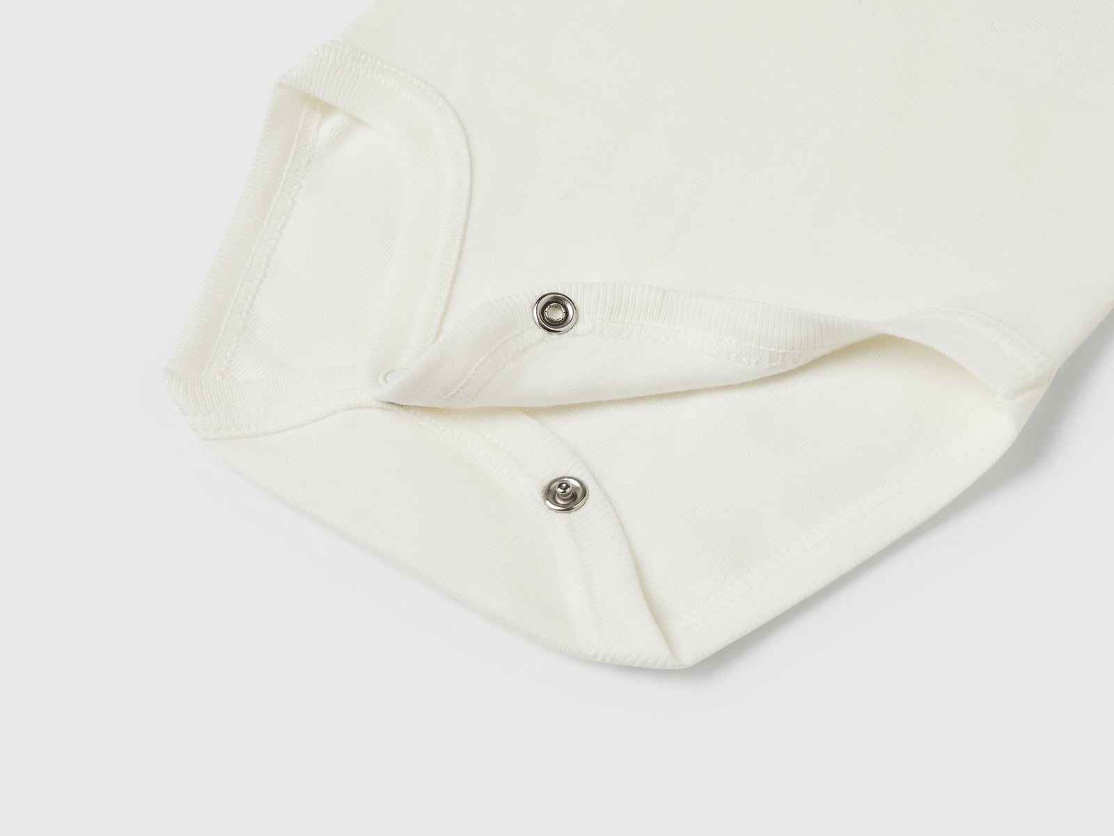 Body con colletto in cotone da neonato bianco panna 3 | Benetton Outlet