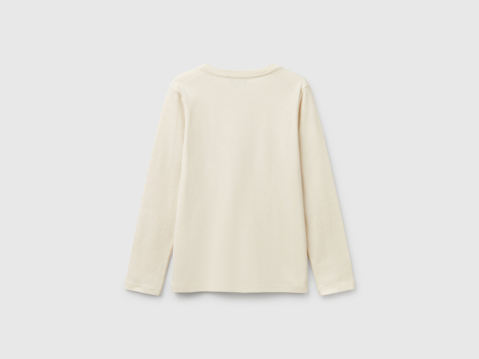 Maglietta a manica lunga con stampa glitter da bambina bianco panna 2 | Benetton Outlet