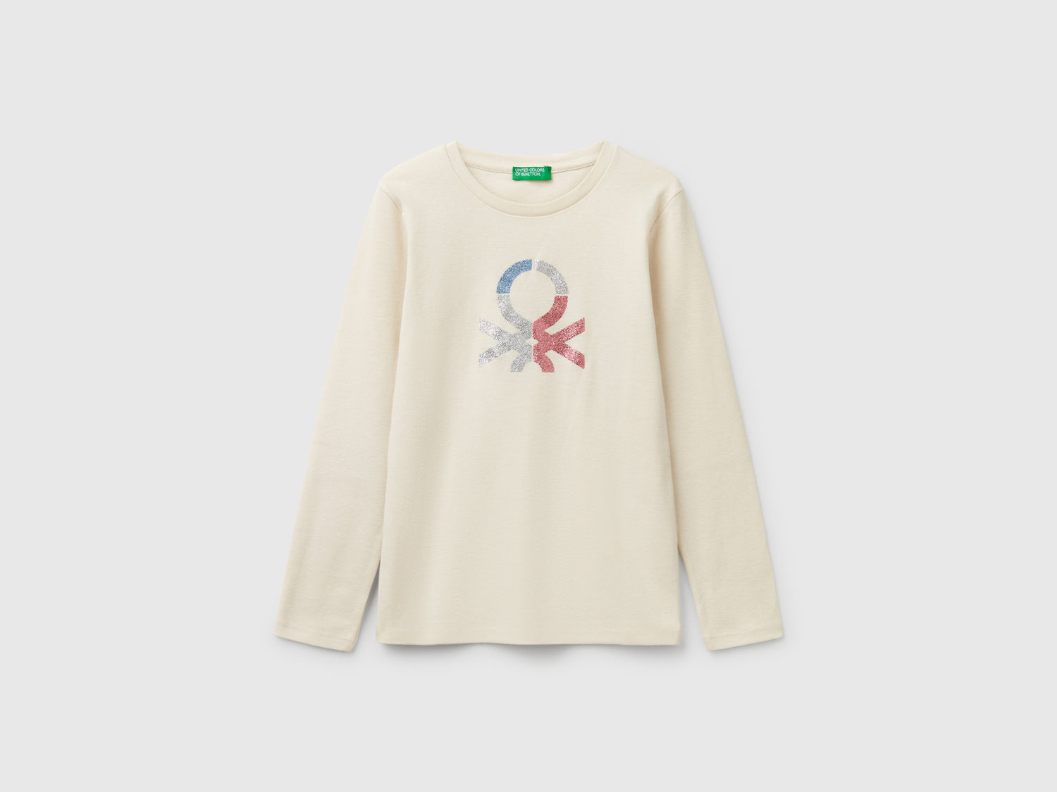 Maglietta a manica lunga con stampa glitter da bambina bianco panna | Benetton Outlet