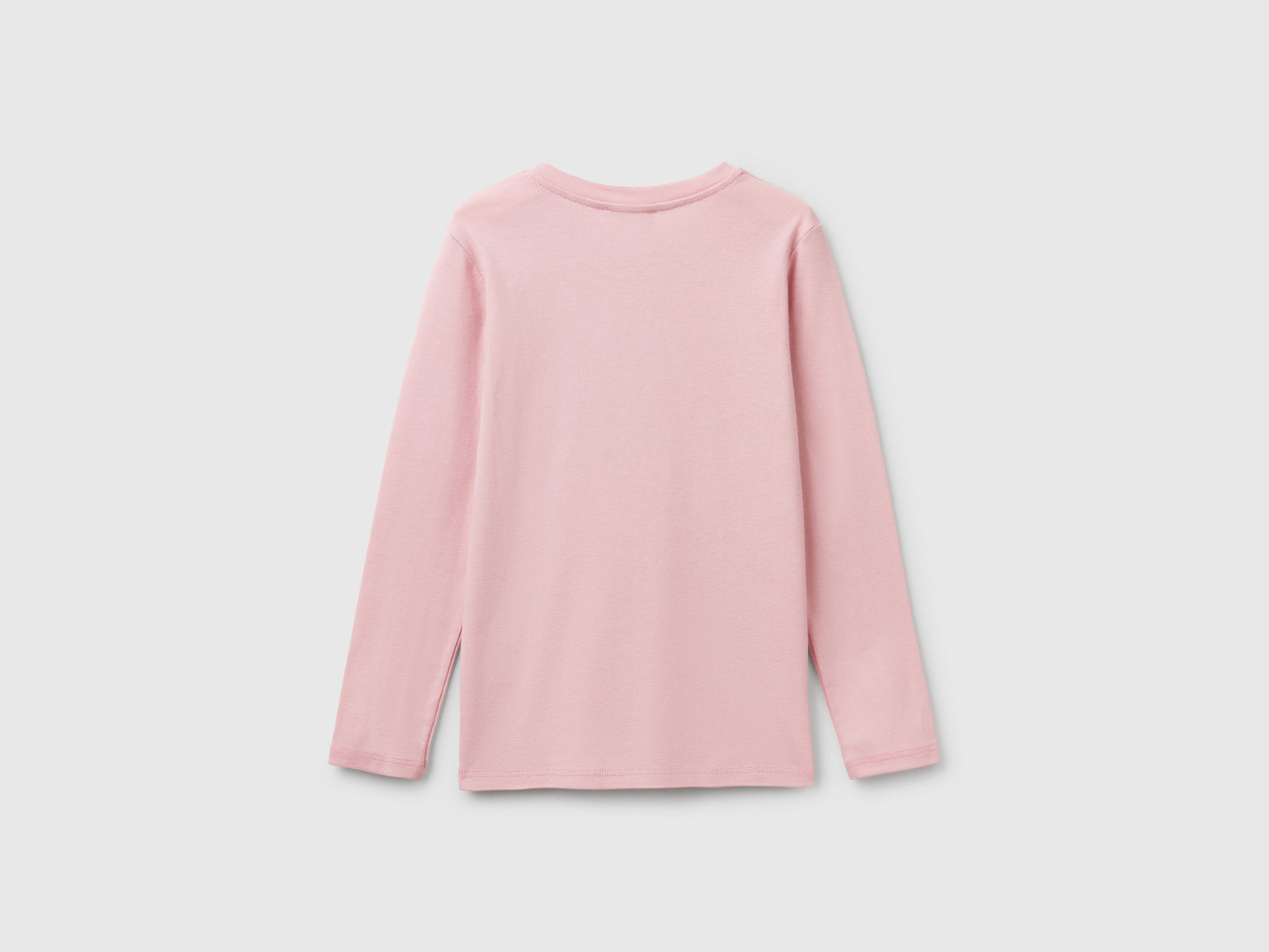 Maglietta a manica lunga con stampa glitter da bambina rosa 2 | Benetton Outlet