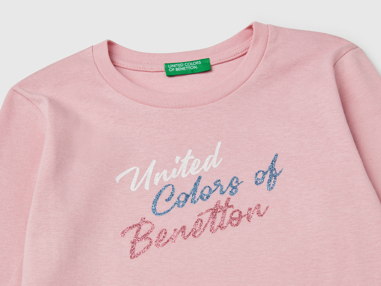 Maglietta a manica lunga con stampa glitter da bambina rosa 3 | Benetton Outlet