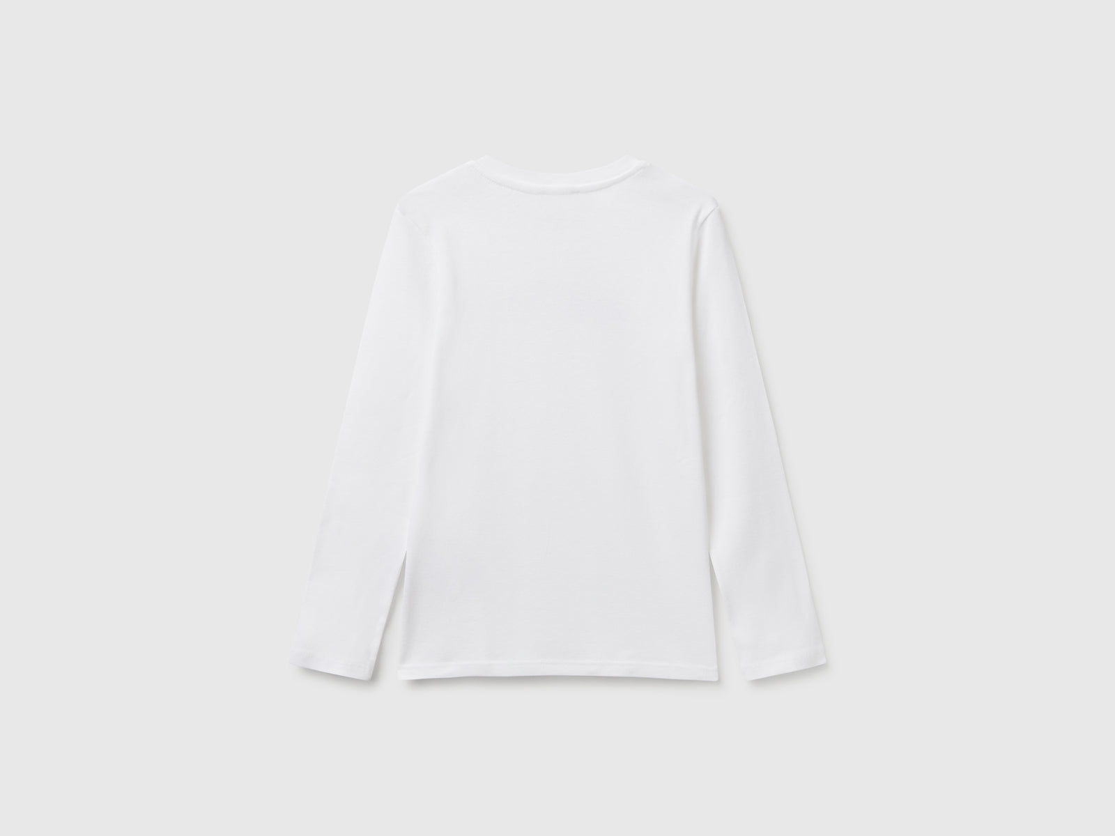 Maglietta a manica lunga con stampa glitter da bambina bianco 2 | Benetton Outlet