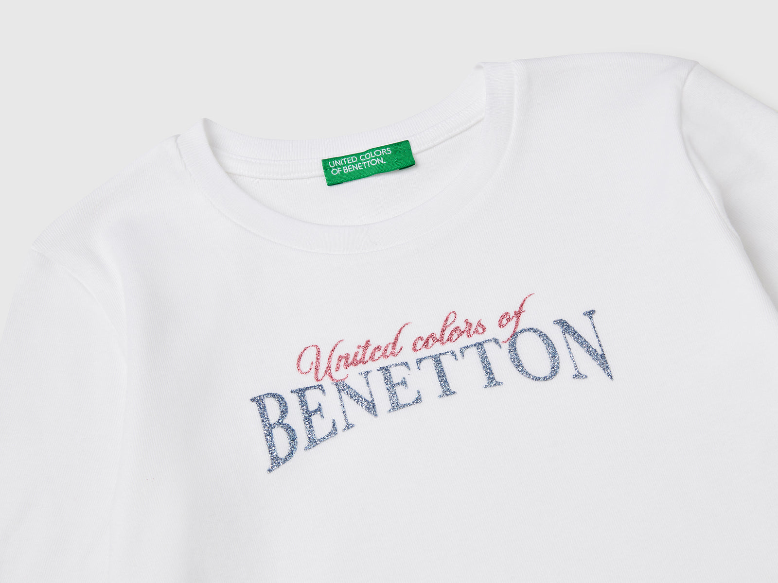 Maglietta a manica lunga con stampa glitter da bambina bianco 3 | Benetton Outlet