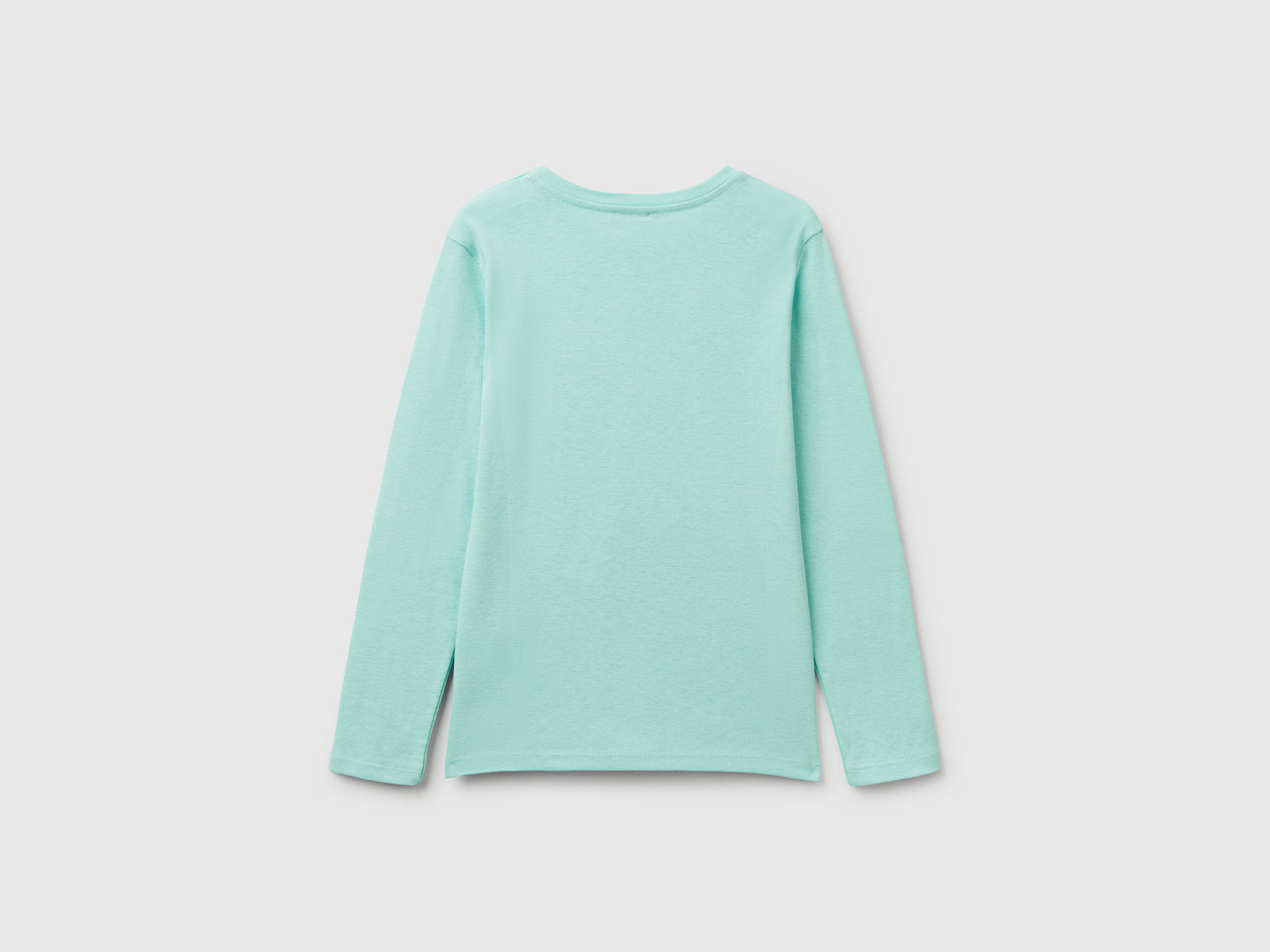 Maglietta a manica lunga con stampa glitter da bambina verde acqua 2 | Benetton Outlet