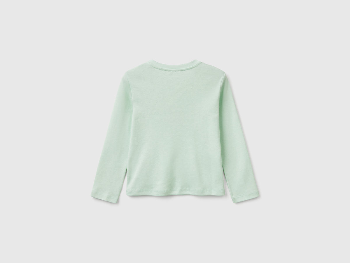 T-shirt slim fit con stampa glitter