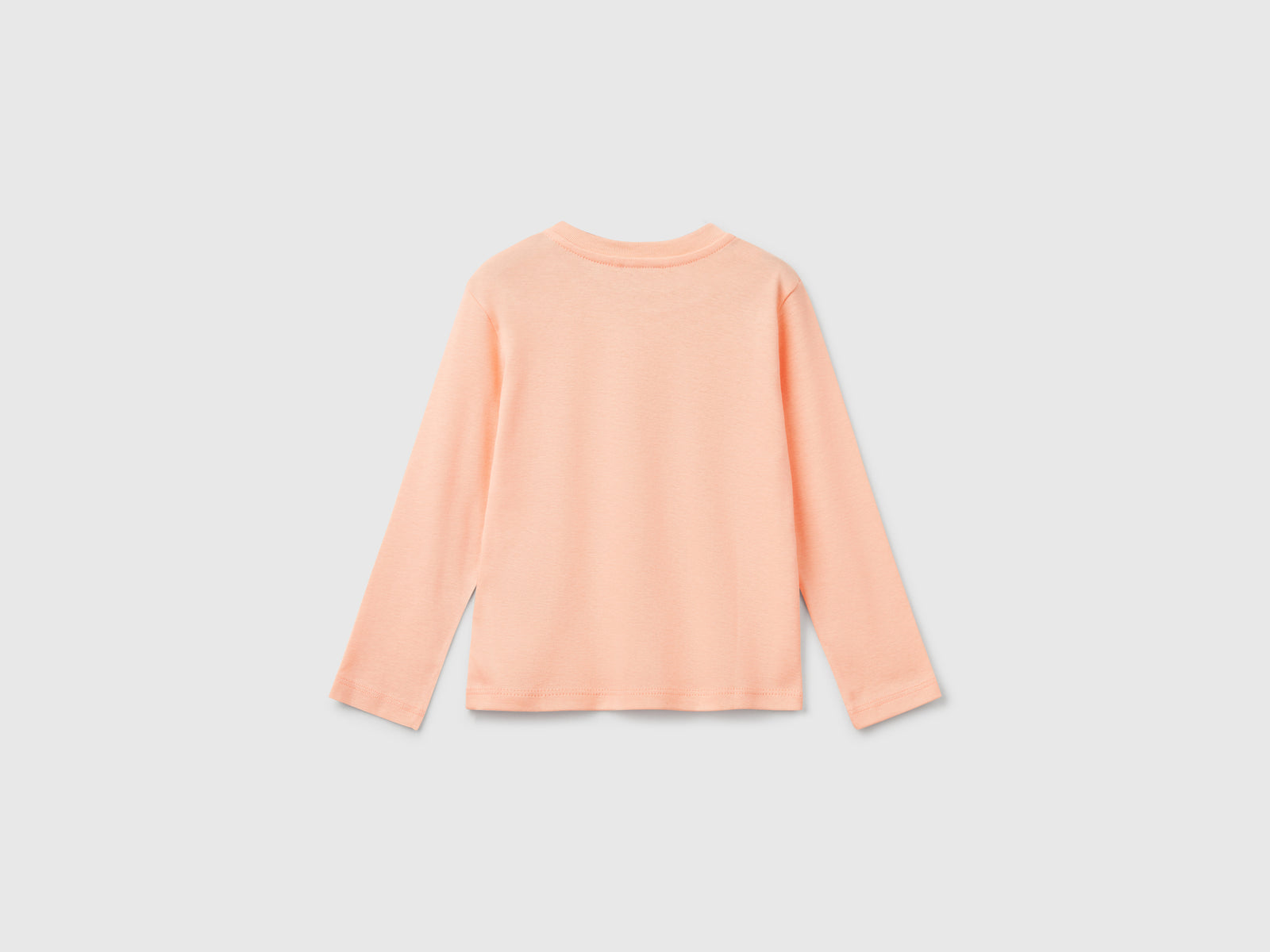 T-shirt slim fit con stampa glitter da bimba pesca 2 | Benetton Outlet