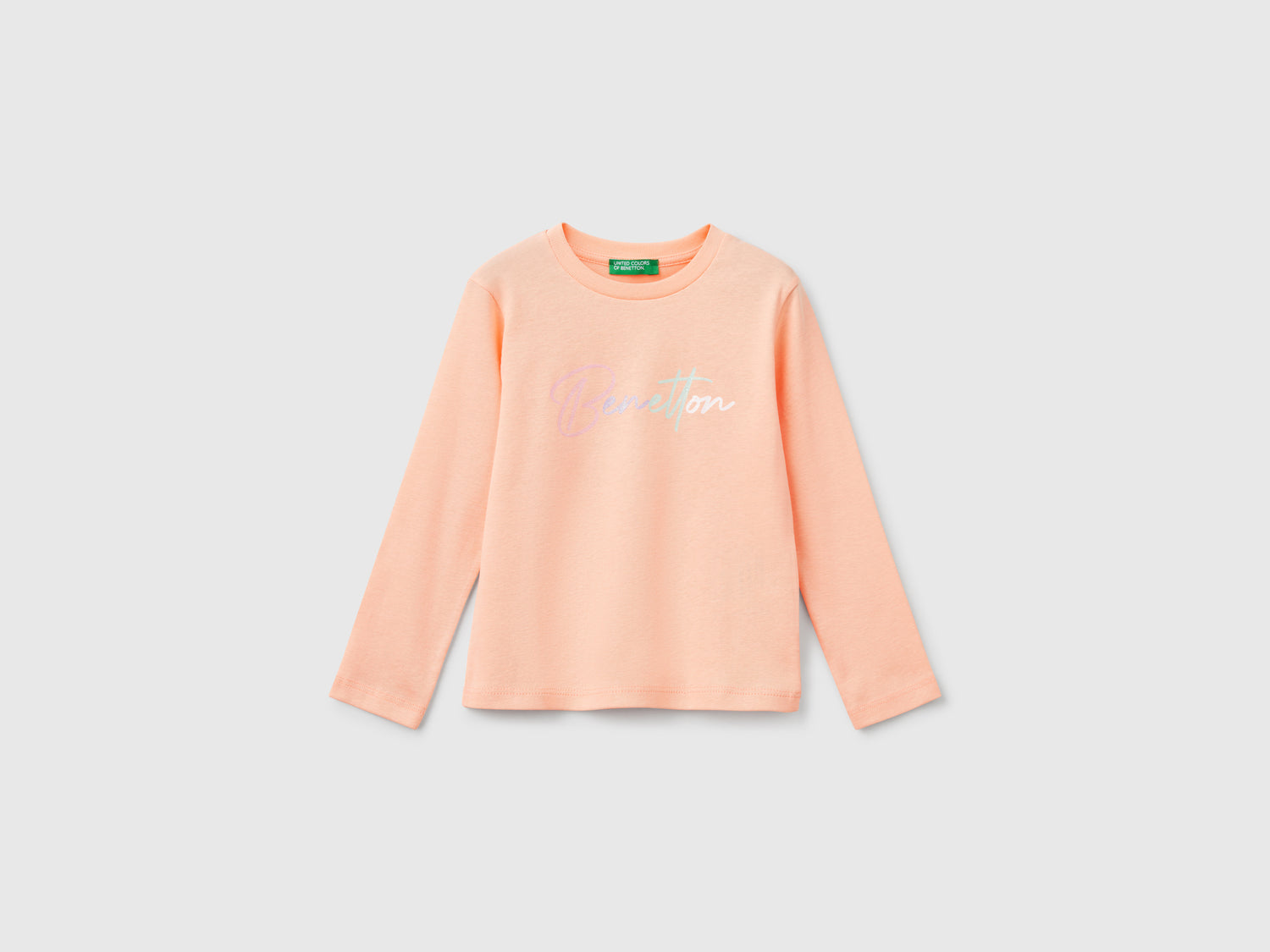 T-shirt slim fit con stampa glitter da bimba pesca | Benetton Outlet