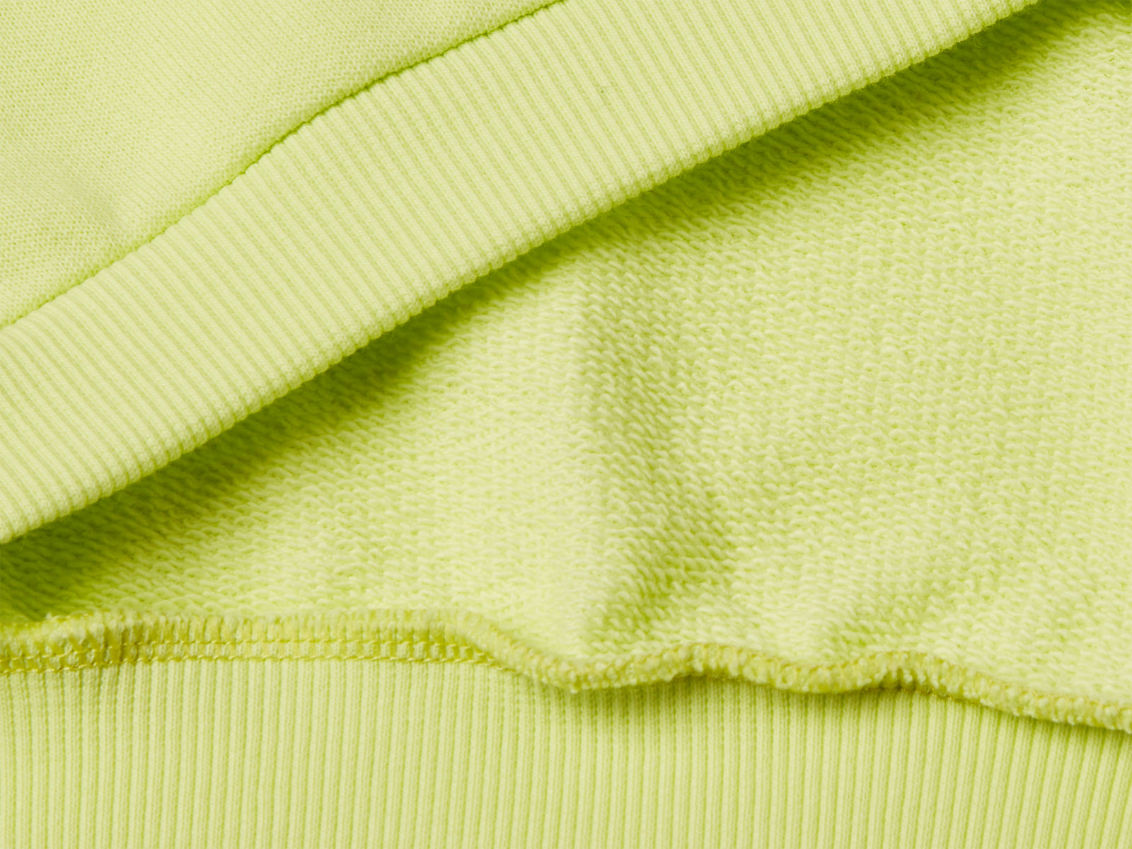 Felpa con stampa e cappuccio da bambina lime 3 | Benetton Outlet