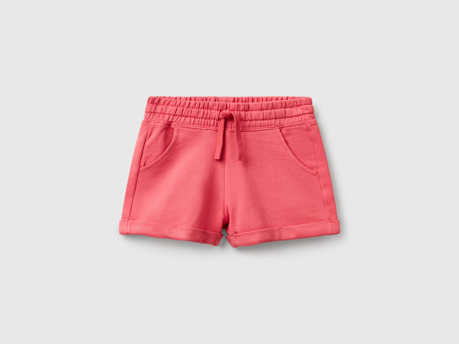 Shorts in felpa 100% cotone da bambina salmone | Benetton Outlet